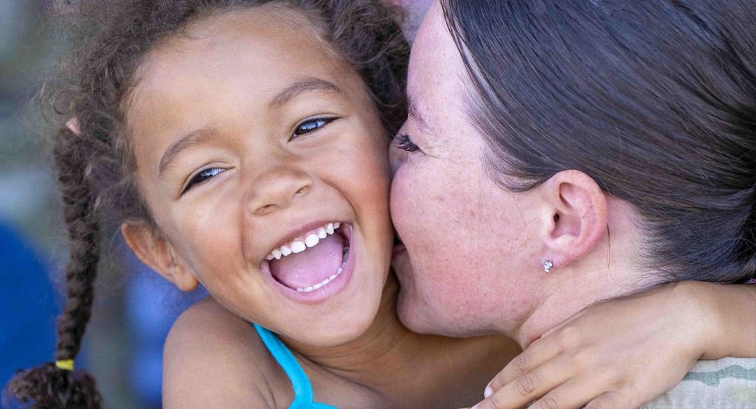 Child hugging mother